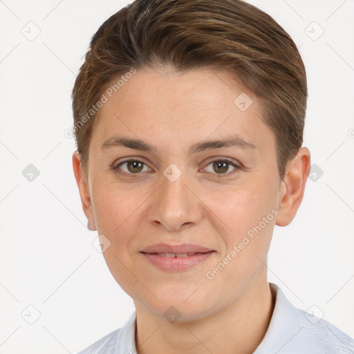 Joyful white young-adult female with short  brown hair and brown eyes