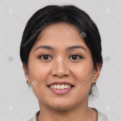 Joyful asian young-adult female with medium  brown hair and brown eyes