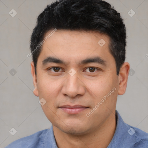 Joyful white young-adult male with short  black hair and brown eyes