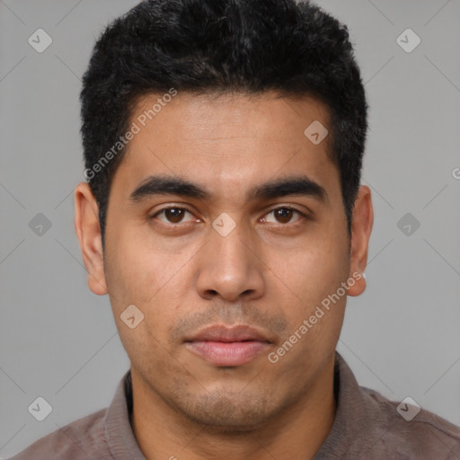 Neutral latino young-adult male with short  black hair and brown eyes