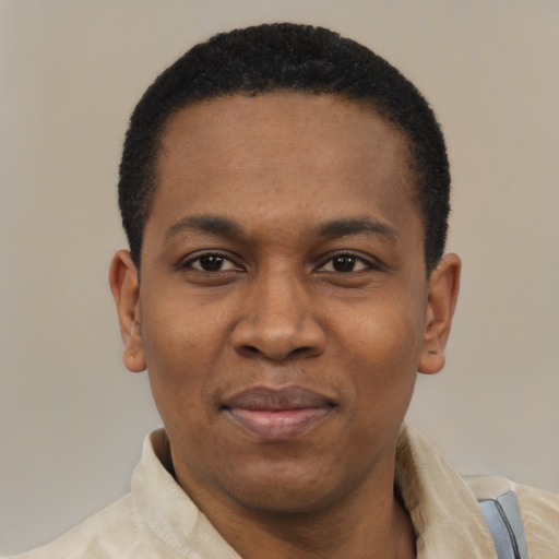 Joyful latino adult male with short  black hair and brown eyes