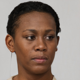 Neutral black young-adult female with short  brown hair and brown eyes