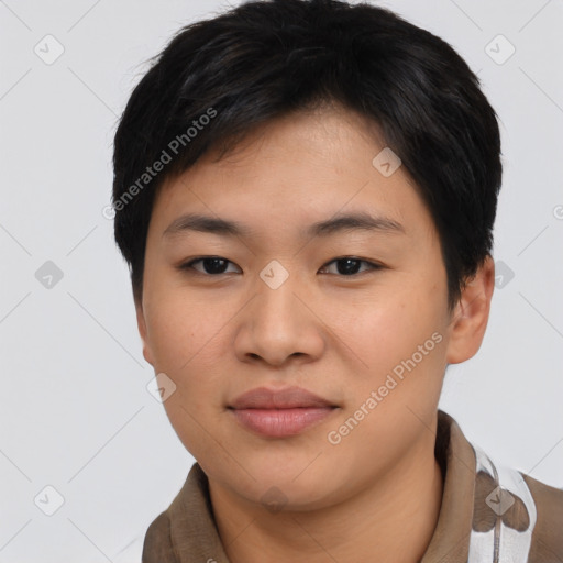 Joyful asian young-adult female with short  black hair and brown eyes