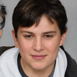 Joyful white young-adult male with medium  brown hair and brown eyes