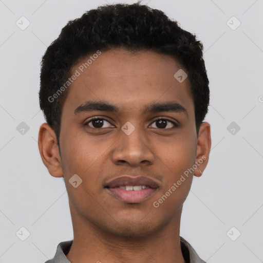 Joyful latino young-adult male with short  brown hair and brown eyes