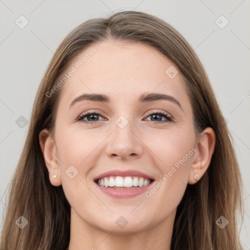 Joyful white young-adult female with long  brown hair and grey eyes