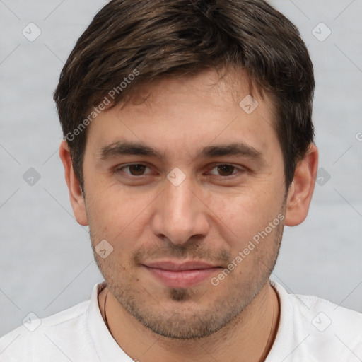 Joyful white young-adult male with short  brown hair and brown eyes