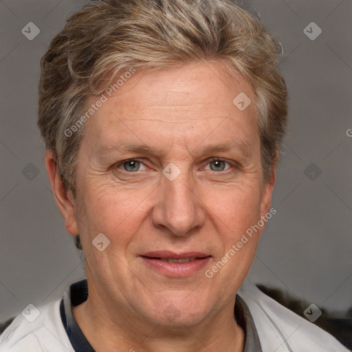 Joyful white middle-aged male with short  brown hair and brown eyes