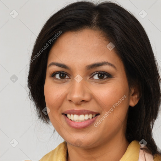 Joyful latino young-adult female with medium  brown hair and brown eyes