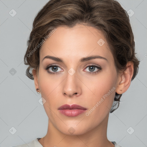 Neutral white young-adult female with short  brown hair and brown eyes