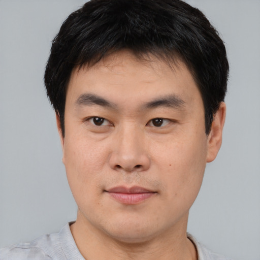 Neutral asian young-adult male with short  black hair and brown eyes