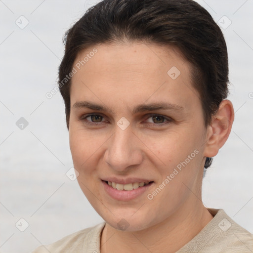 Joyful white young-adult female with short  brown hair and brown eyes