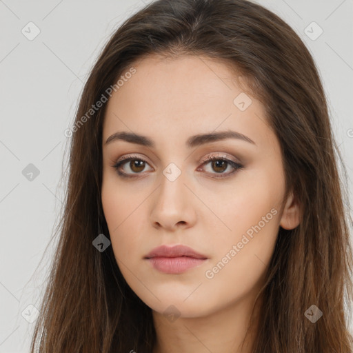 Neutral white young-adult female with long  brown hair and brown eyes