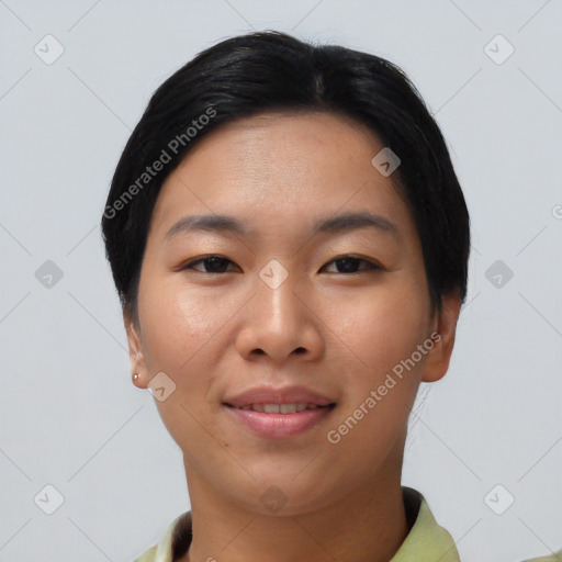 Joyful asian young-adult female with short  black hair and brown eyes