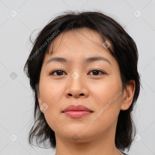 Joyful asian young-adult female with medium  brown hair and brown eyes