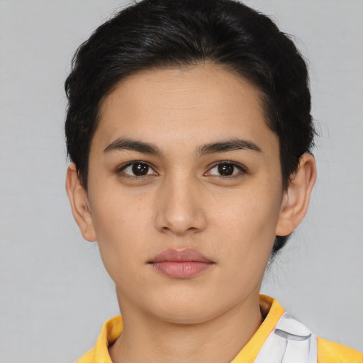 Neutral white young-adult female with short  brown hair and brown eyes