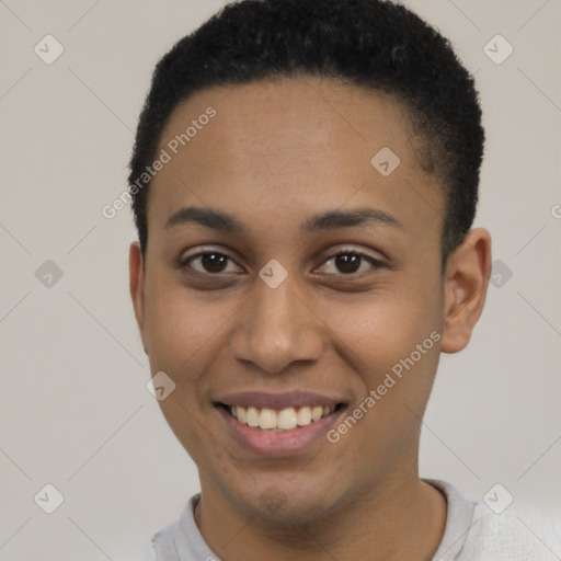 Joyful latino young-adult female with short  black hair and brown eyes