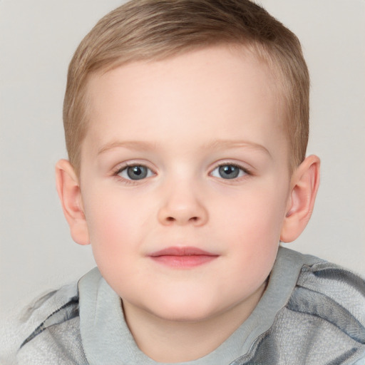 Joyful white child female with short  brown hair and grey eyes