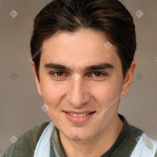 Joyful white adult male with short  brown hair and brown eyes