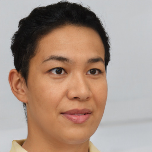 Joyful asian young-adult female with short  brown hair and brown eyes