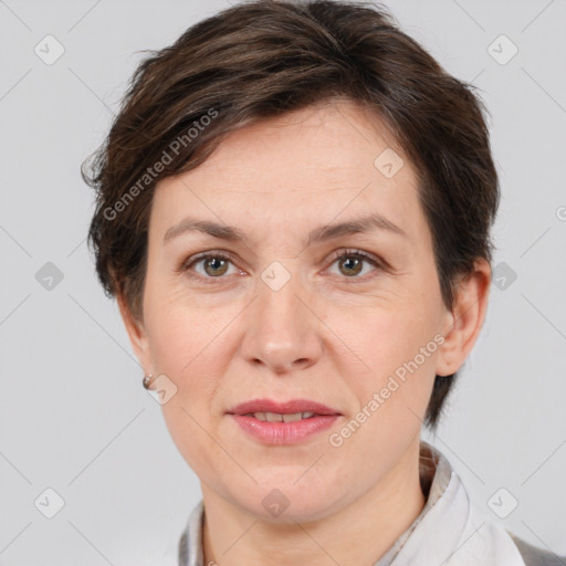 Joyful white adult female with short  brown hair and brown eyes