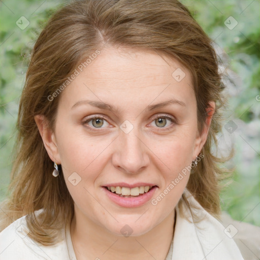 Joyful white adult female with medium  brown hair and blue eyes