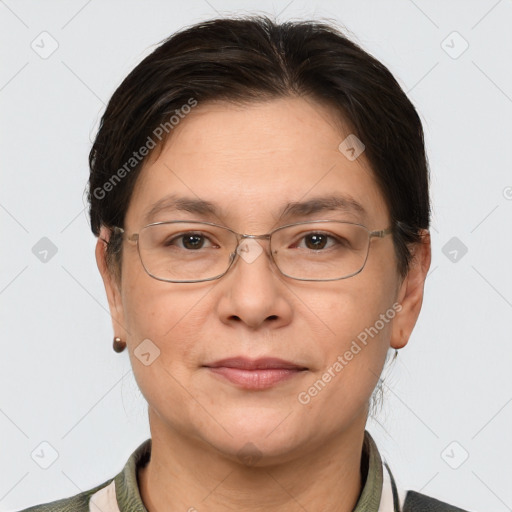 Joyful white adult female with short  brown hair and grey eyes