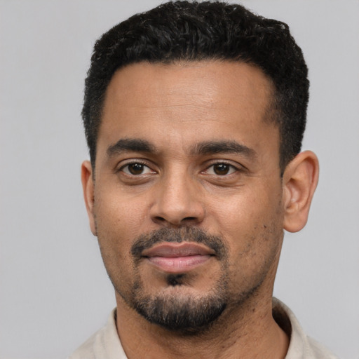 Neutral black young-adult male with short  black hair and brown eyes