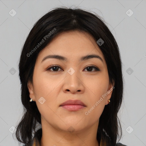 Joyful asian young-adult female with long  brown hair and brown eyes