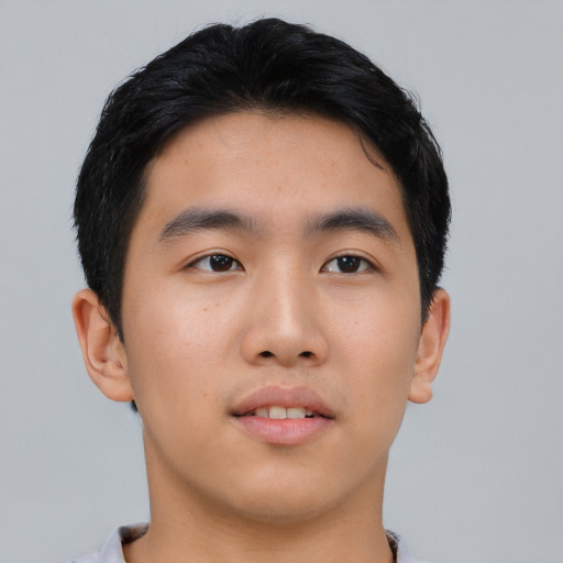 Neutral asian young-adult male with short  black hair and brown eyes