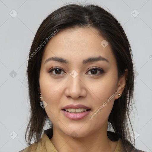 Joyful latino young-adult female with medium  brown hair and brown eyes