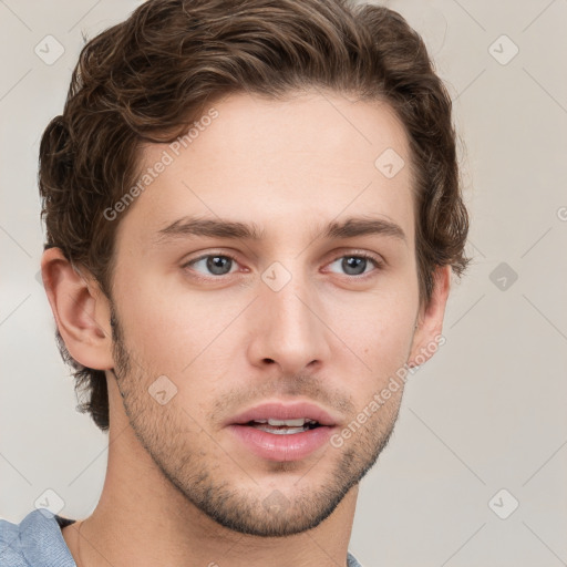 Neutral white young-adult male with short  brown hair and grey eyes