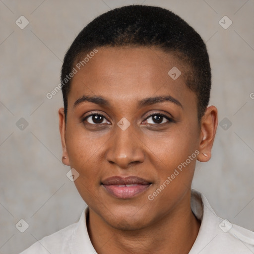 Joyful black young-adult female with short  black hair and brown eyes