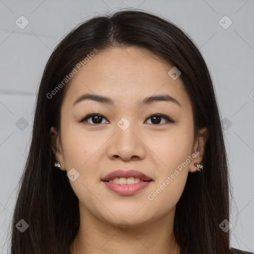 Joyful asian young-adult female with long  brown hair and brown eyes