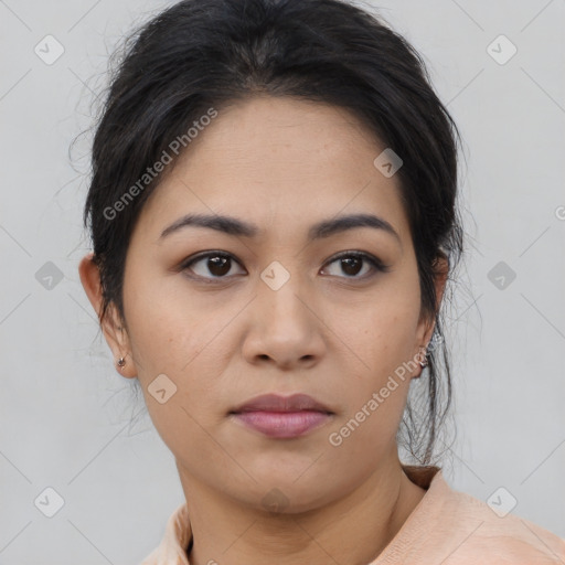 Joyful asian young-adult female with medium  black hair and brown eyes