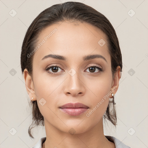 Neutral white young-adult female with medium  brown hair and brown eyes