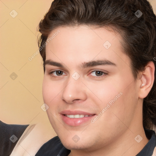 Joyful white young-adult male with medium  brown hair and brown eyes