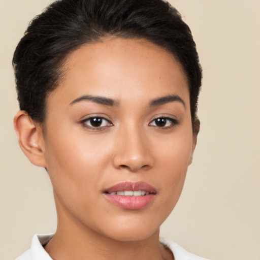 Joyful latino young-adult female with short  brown hair and brown eyes