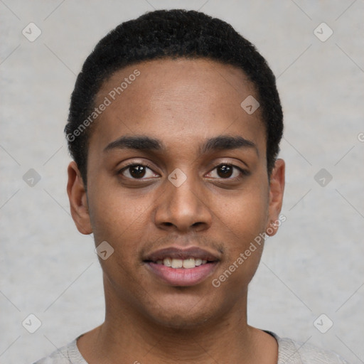 Joyful black young-adult male with short  black hair and brown eyes