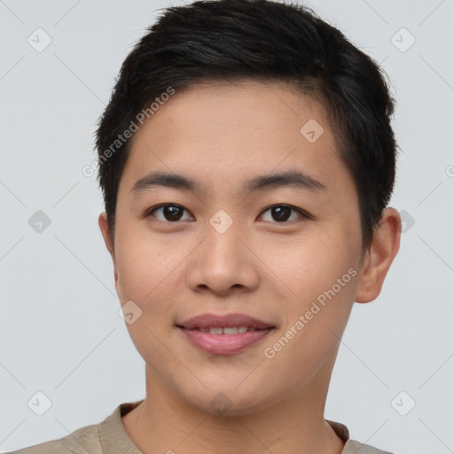 Joyful asian young-adult male with short  brown hair and brown eyes