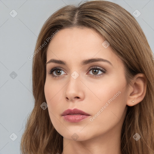 Neutral white young-adult female with long  brown hair and brown eyes