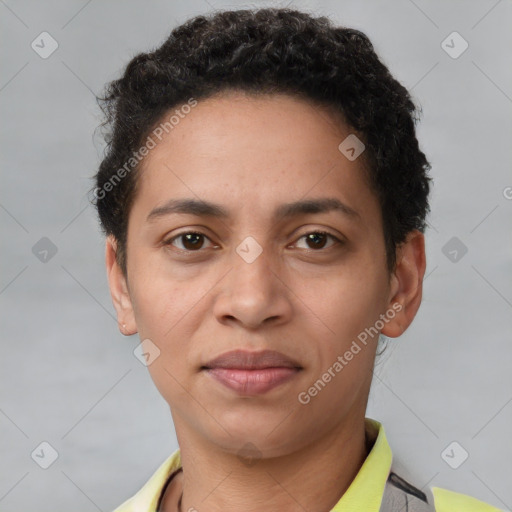 Joyful latino young-adult female with short  brown hair and brown eyes