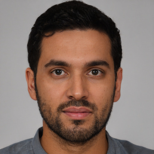 Neutral latino young-adult male with short  black hair and brown eyes