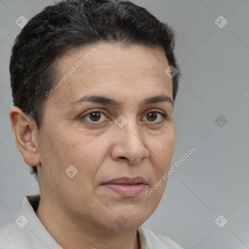 Joyful white adult female with short  brown hair and brown eyes