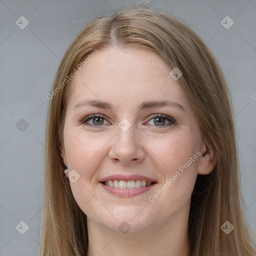 Joyful white young-adult female with long  brown hair and grey eyes