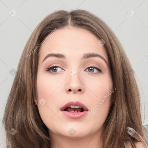 Neutral white young-adult female with long  brown hair and grey eyes