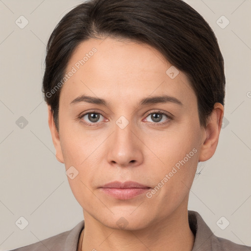 Neutral white young-adult female with short  brown hair and brown eyes