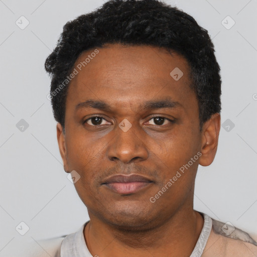 Neutral black young-adult male with short  black hair and brown eyes