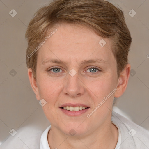 Joyful white young-adult female with short  brown hair and grey eyes