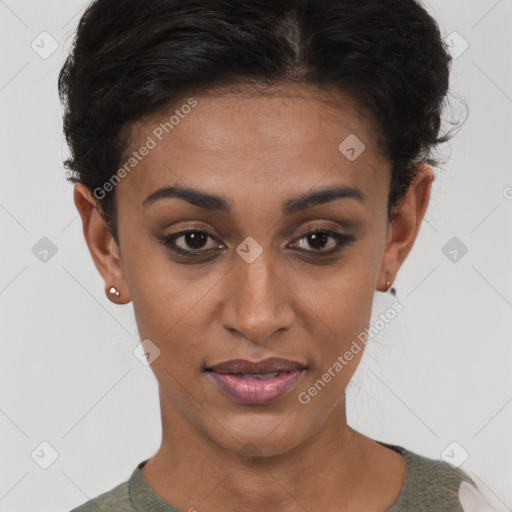 Joyful black young-adult female with short  brown hair and brown eyes